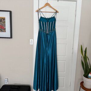 Beaded Formal Gown with side slit and Mermaid Tail